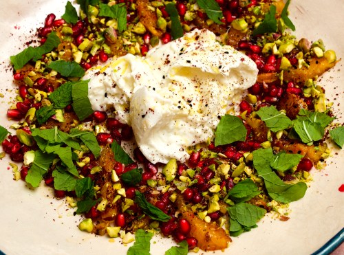 Burrata with burnt orange, pistachio and pomegranate