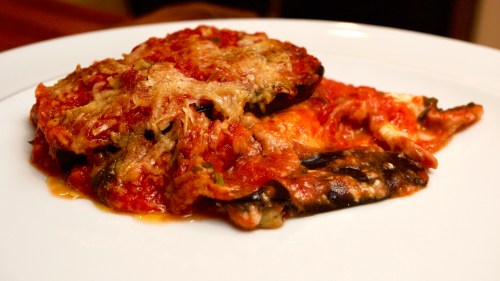 Parmigiana di Melanzane e Pepperoni con Prosciutto di Parma