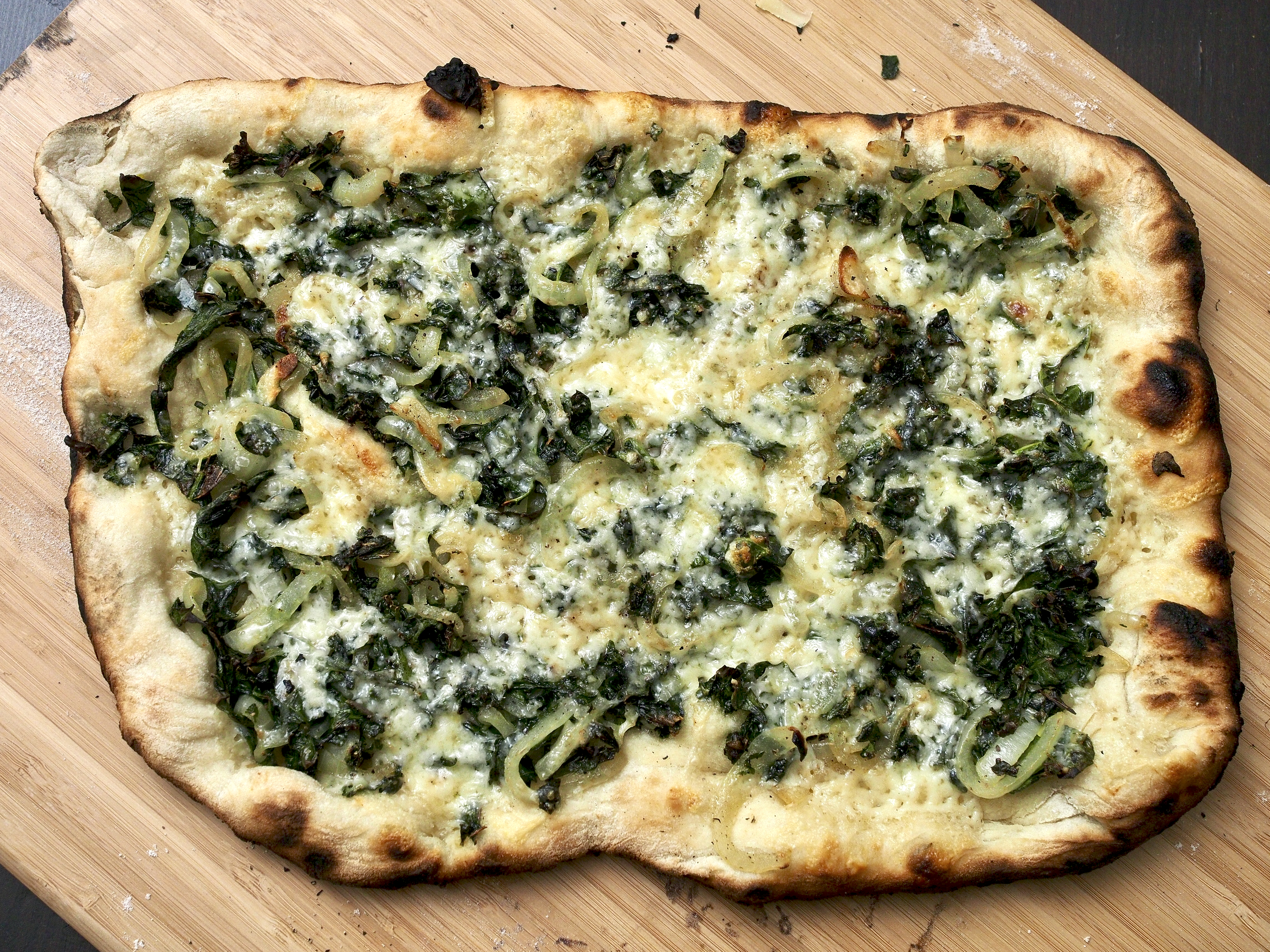 Kale &amp; onion pizza